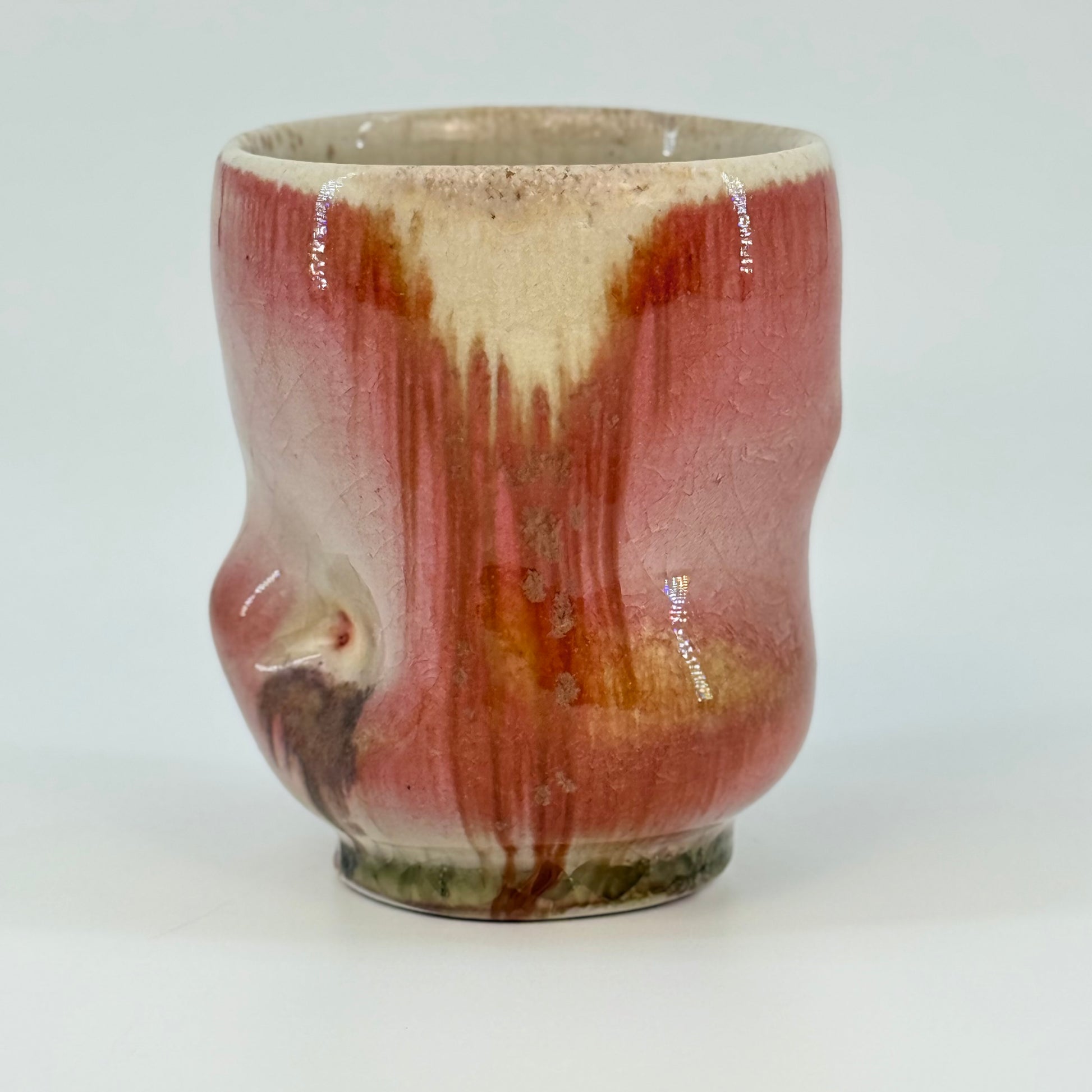 Ceramic cup with pink glaze 